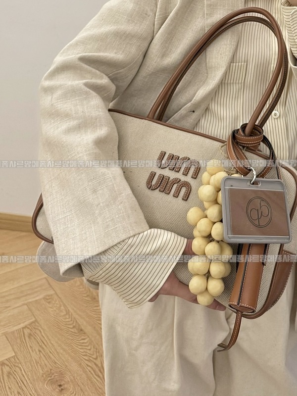 미우미우캔버스가죽보백  20260314-122400-023루.jpg