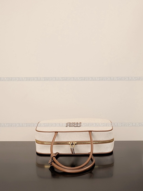 미우미우캔버스가죽보백  20260314-122351-004루.jpg