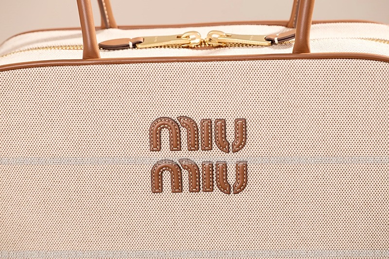 미우미우캔버스가죽보백  20260314-122358-015루.jpg