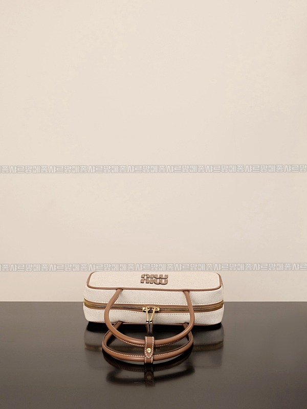 미우미우캔버스가죽보백  20260314-122922-008루.jpg