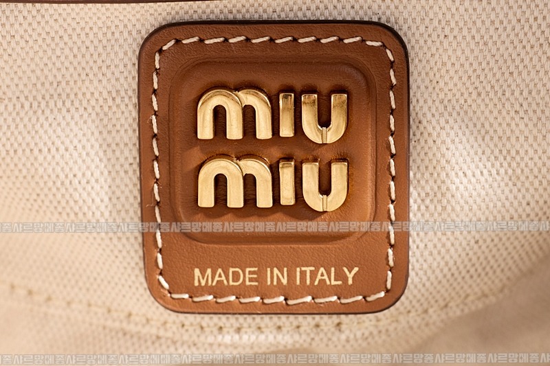 미우미우캔버스가죽보백  20260314-122926-022루.jpg