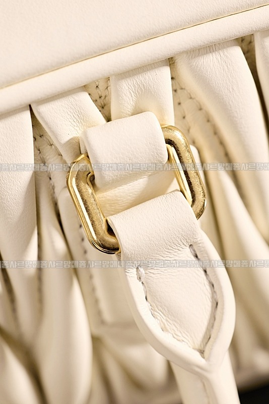 미우미우아르카디마테라세나파가죽백  20260314-150528-021루.jpg