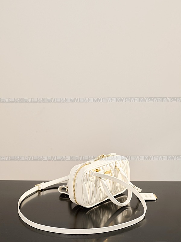 미우미우아르카디마테라세나파가죽백  20260314-153328-006루.jpg