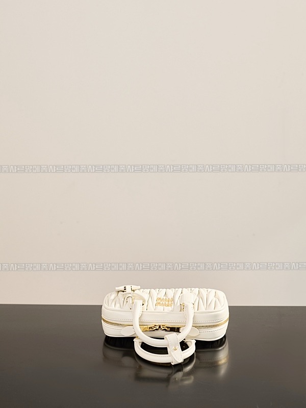 미우미우아르카디마테라세나파가죽백  20260314-153328-009루.jpg