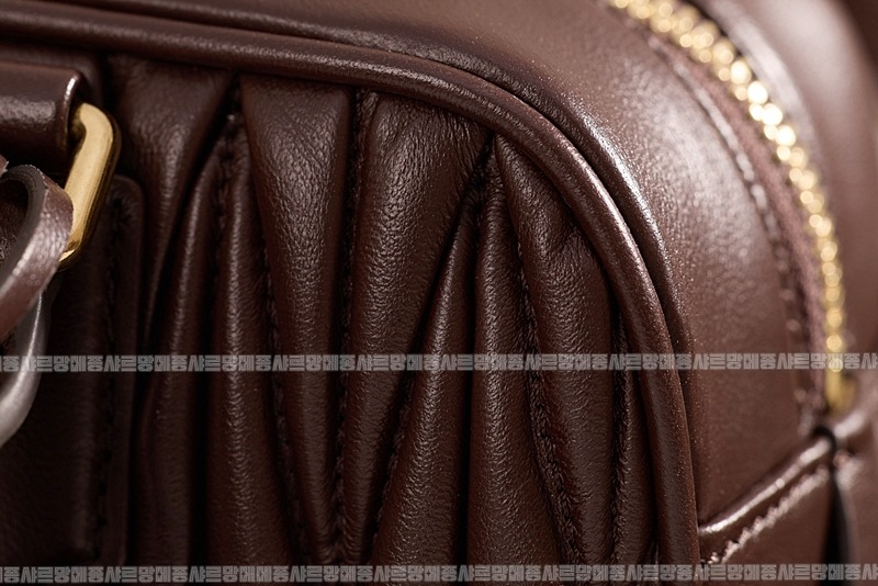 미우미우아르카디마테라세나파가죽백  20260314-160432-011루.jpg