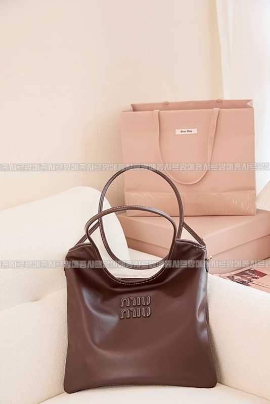 미우미우아이비캔버스토트백 20260315-113312-021루.jpg