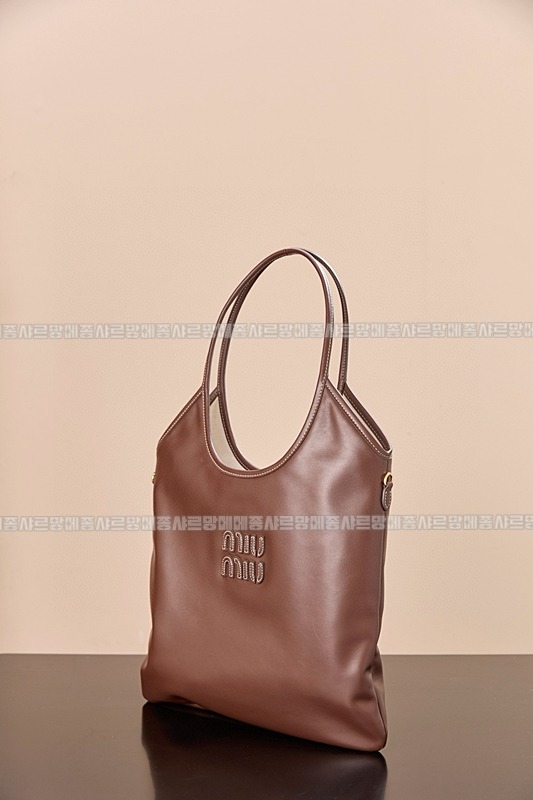 미우미우아이비캔버스토트백 20260315-113309-003루.jpg