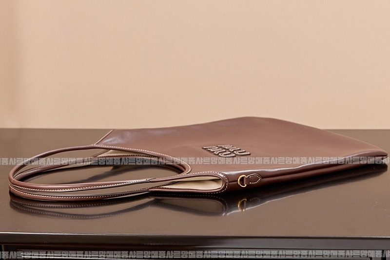 미우미우아이비캔버스토트백 20260315-113310-006루.jpg