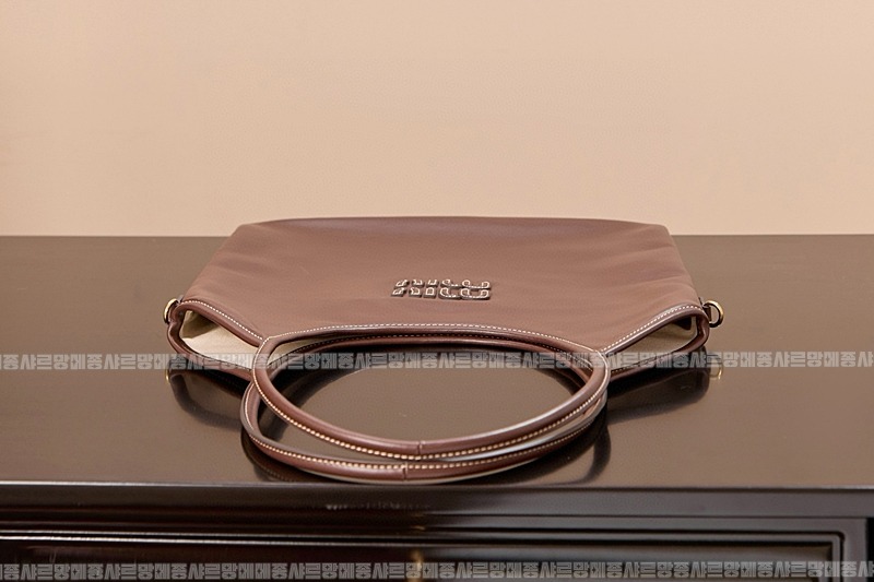 미우미우아이비캔버스토트백 20260315-113310-008루.jpg