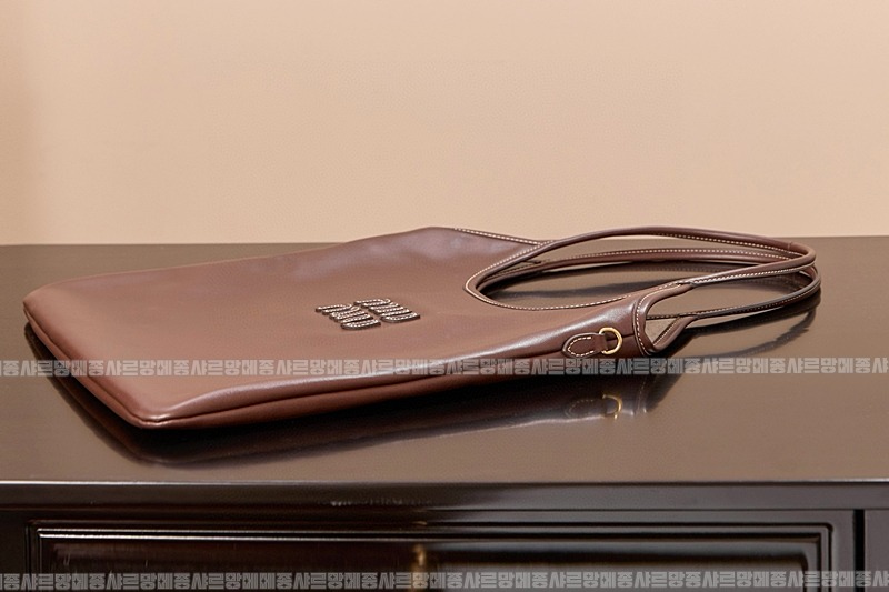 미우미우아이비캔버스토트백 20260315-113310-009루.jpg