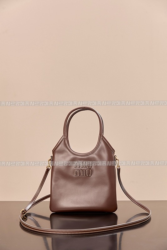 미우미우아이비캔버스토트백 20260315-113900-001루.jpg