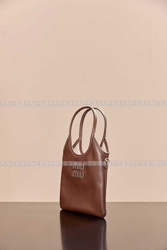 미우미우아이비캔버스토트백 20260315-113901-004루.jpg