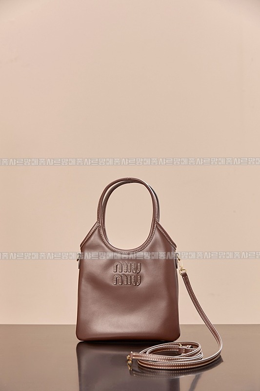 미우미우아이비캔버스토트백 20260315-113901-003루.jpg