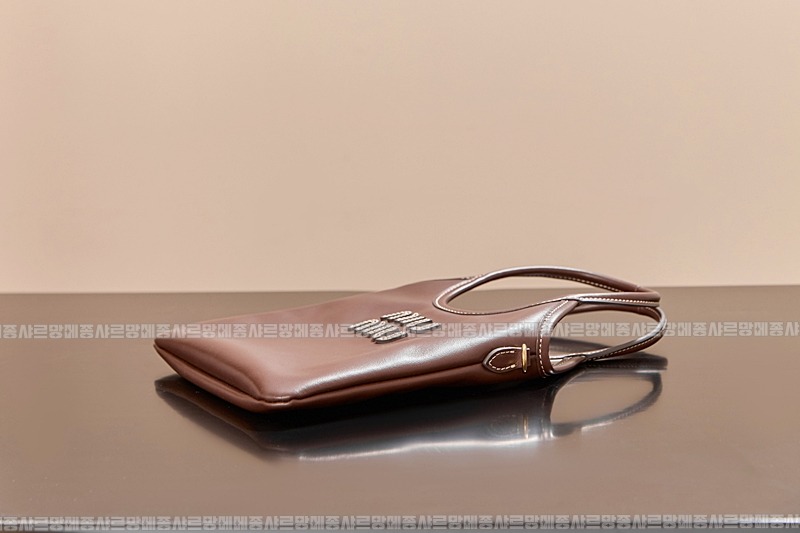 미우미우아이비캔버스토트백 20260315-113901-009루.jpg