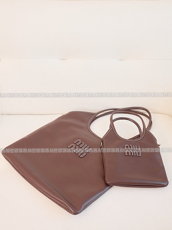 미우미우아이비캔버스토트백 20260315-113902-010루.jpg