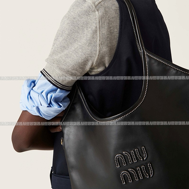 미우미우아이비캔버스토트백 20260315-115610-028루.jpg