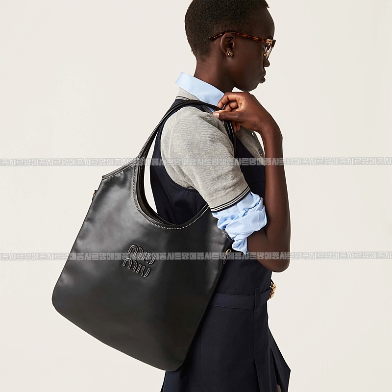 미우미우아이비캔버스토트백 20260315-115610-027루.jpg