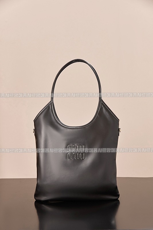 미우미우아이비캔버스토트백 20260315-115606-001루.jpg