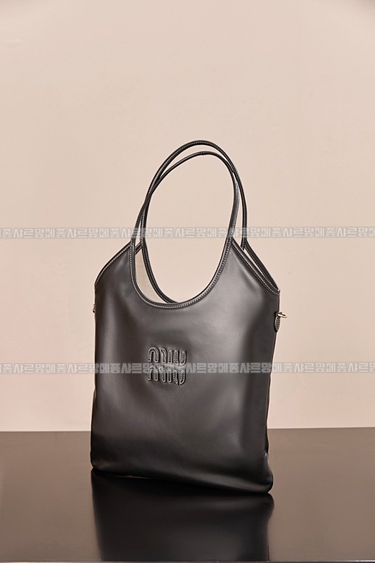 미우미우아이비캔버스토트백 20260315-115606-004루.jpg