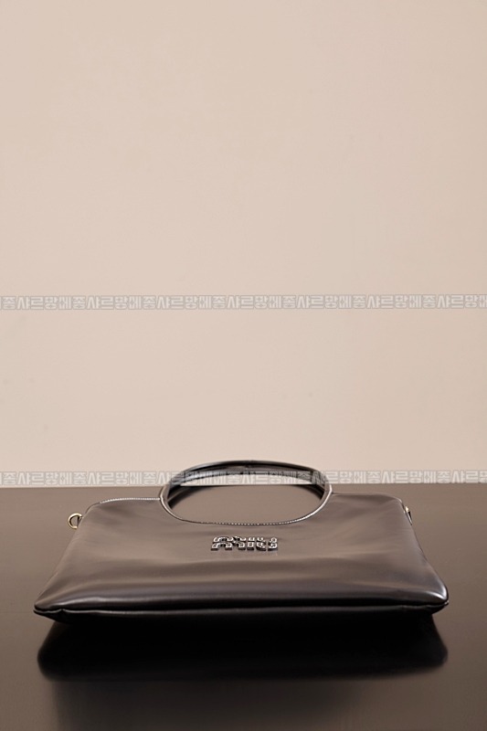 미우미우아이비캔버스토트백 20260315-115607-007루.jpg