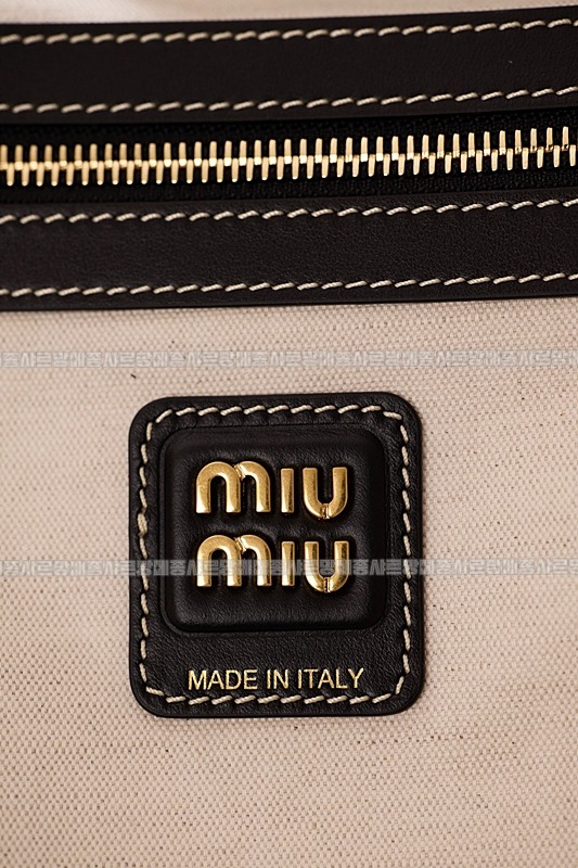 미우미우아이비캔버스토트백 20260315-115608-013루.jpg