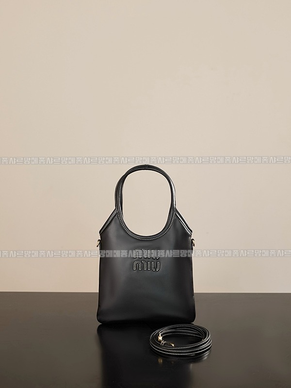 미우미우아이비캔버스토트백 20260315-115954-001루.jpg