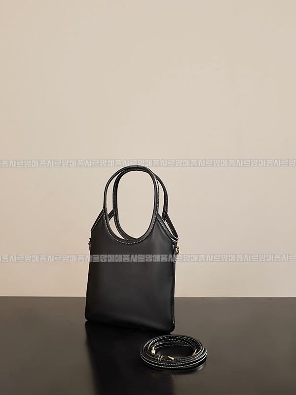 미우미우아이비캔버스토트백 20260315-115955-004루.jpg