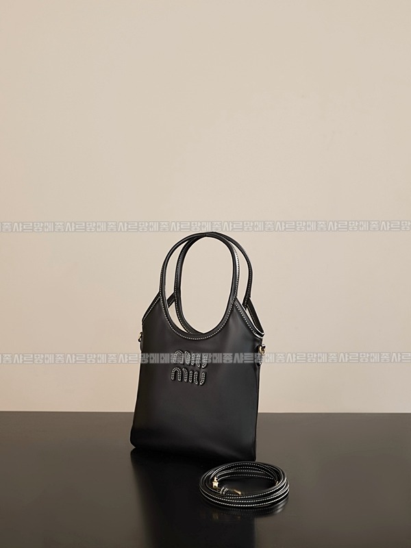 미우미우아이비캔버스토트백 20260315-115954-003루.jpg