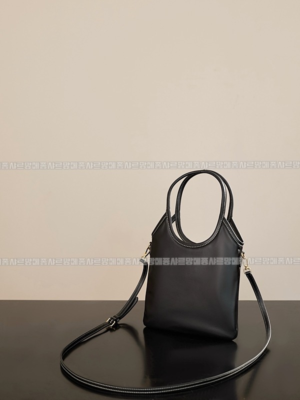 미우미우아이비캔버스토트백 20260315-115955-006루.jpg