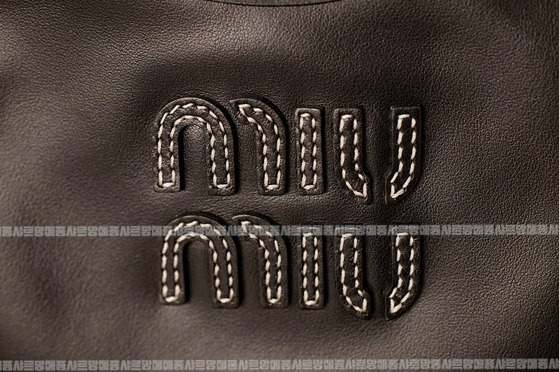 미우미우아이비캔버스토트백 20260315-115956-014루.jpg