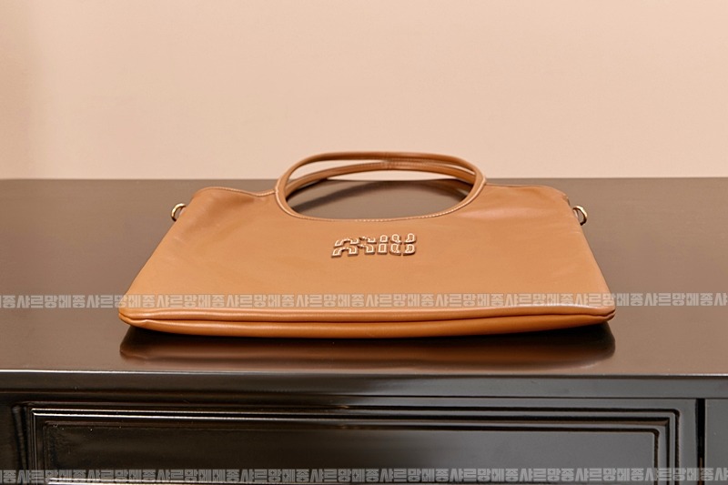 미우미우아이비캔버스토트백 20260315-120619-005루.jpg