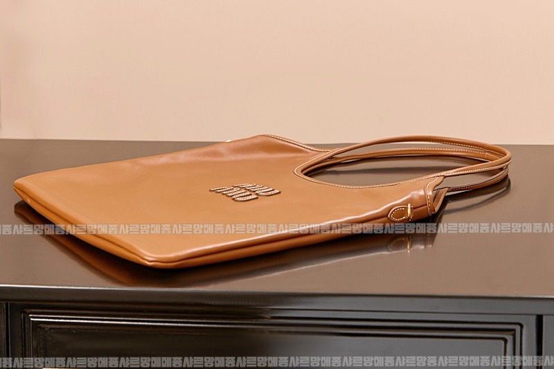 미우미우아이비캔버스토트백 20260315-120619-006루.jpg