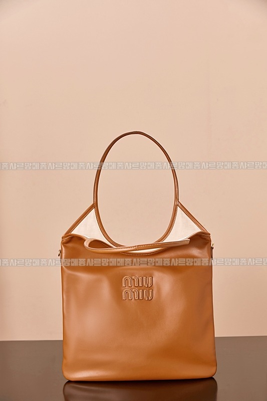 미우미우아이비캔버스토트백 20260315-120620-009루.jpg