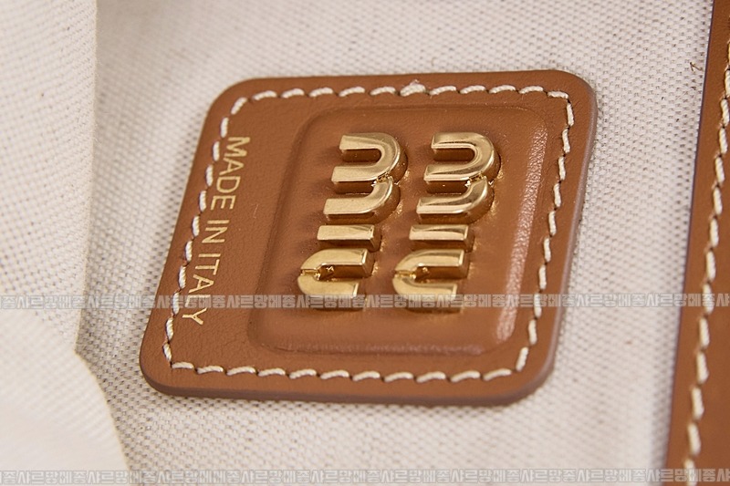 미우미우아이비캔버스토트백 20260315-120621-016루.jpg