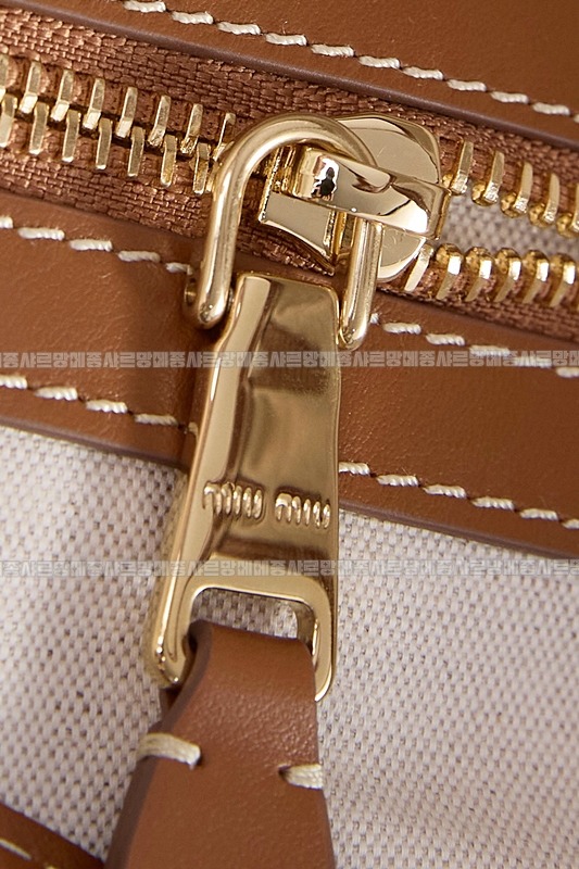 미우미우아이비캔버스토트백 20260315-120621-019루.jpg