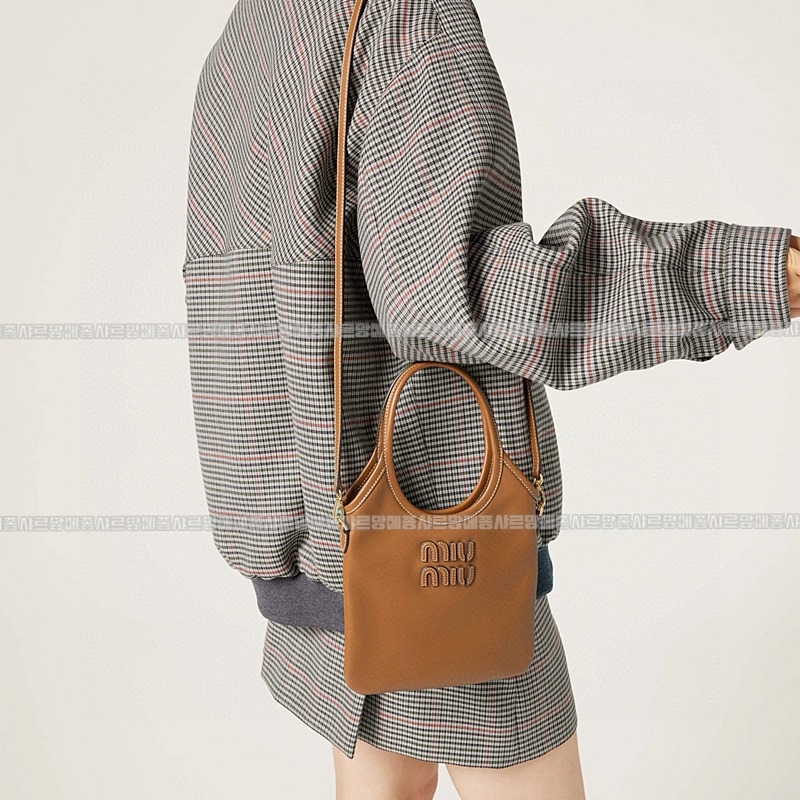 미우미우아이비캔버스토트백 20260315-120927-027루.jpg