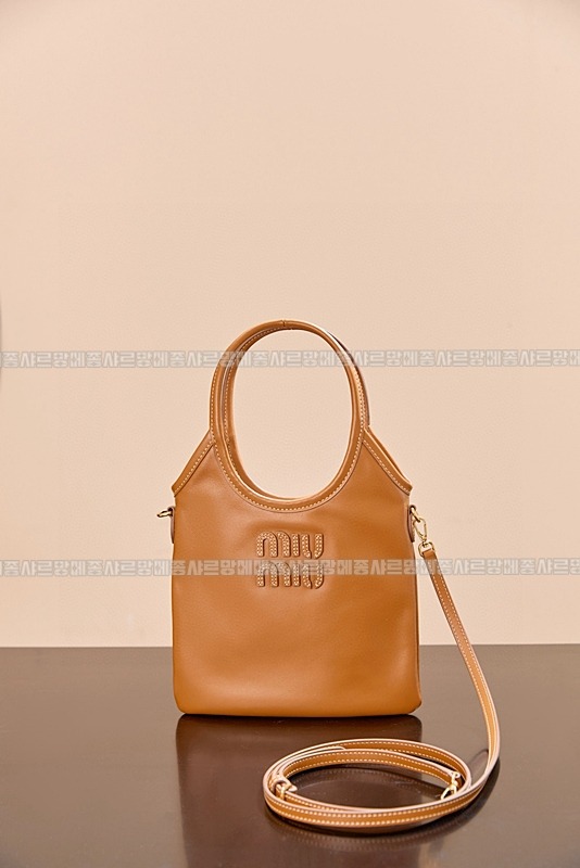 미우미우아이비캔버스토트백 20260315-120922-002루.jpg