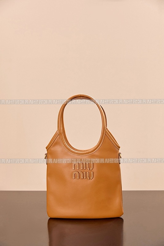 미우미우아이비캔버스토트백 20260315-120922-003루.jpg