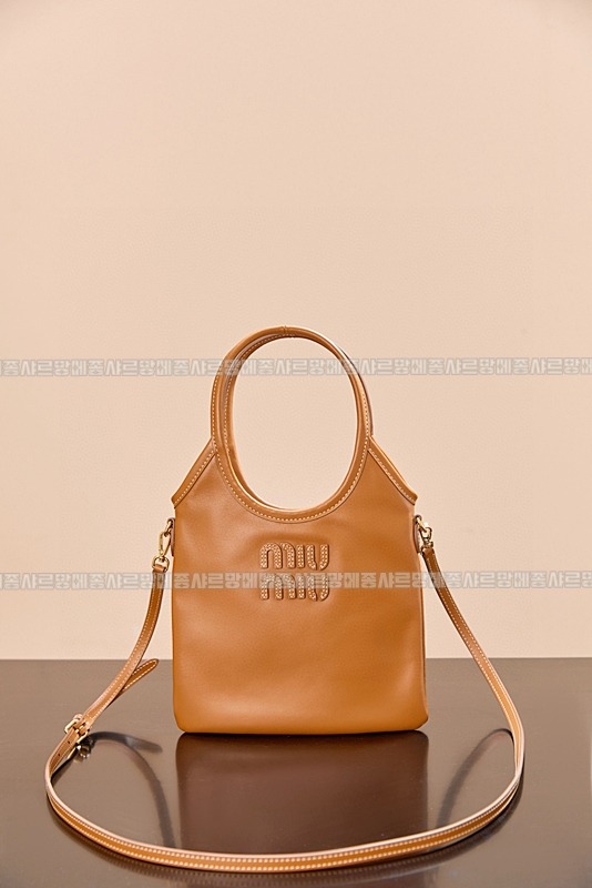 미우미우아이비캔버스토트백 20260315-120922-001루.jpg