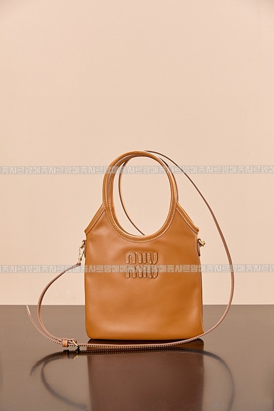 미우미우아이비캔버스토트백 20260315-120922-005루.jpg