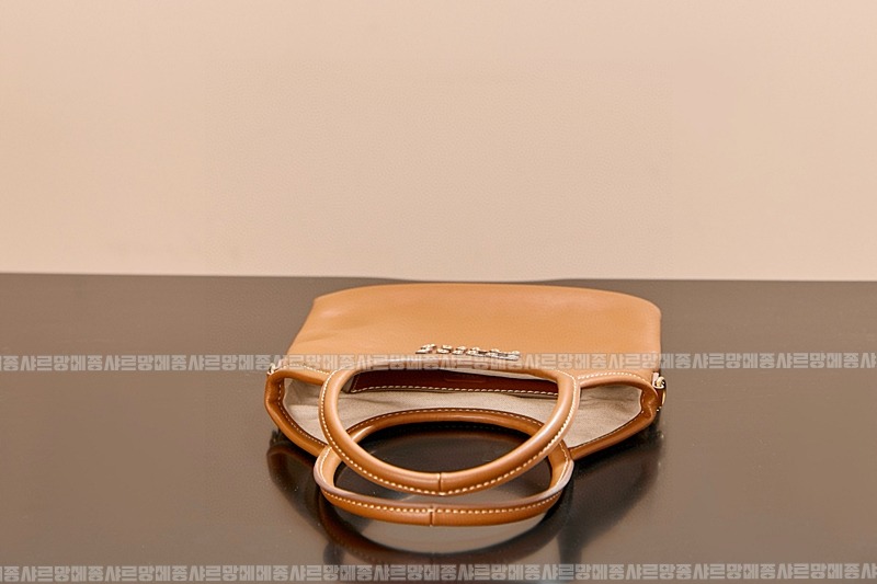 미우미우아이비캔버스토트백 20260315-120922-007루.jpg