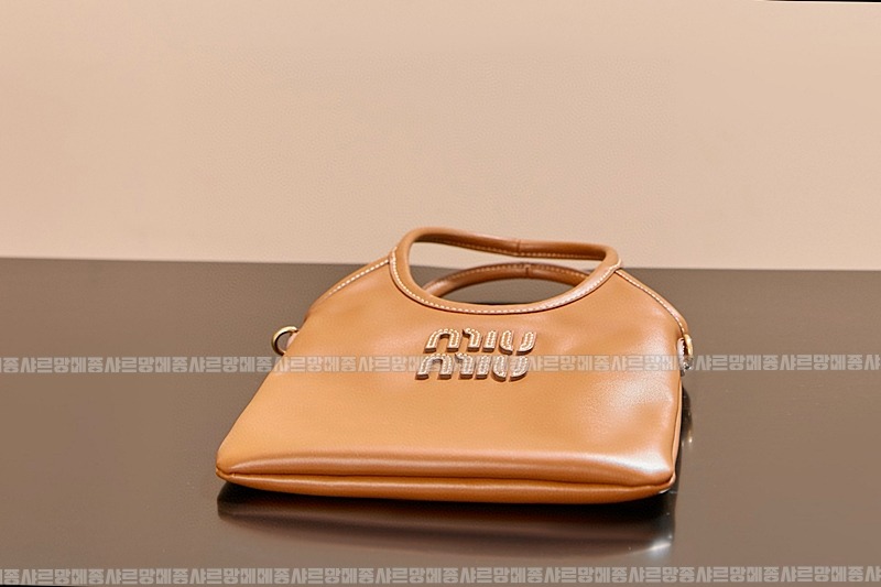 미우미우아이비캔버스토트백 20260315-120923-008루.jpg