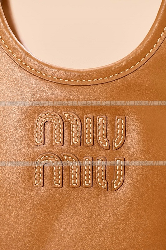 미우미우아이비캔버스토트백 20260315-120925-019루.jpg