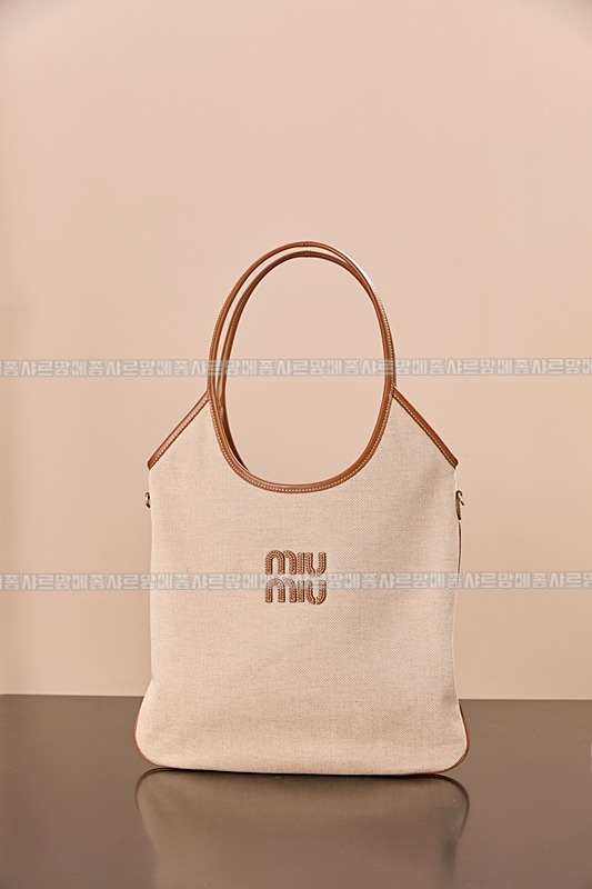 미우미우아이비캔버스토트백 20260315-125114-001루.jpg