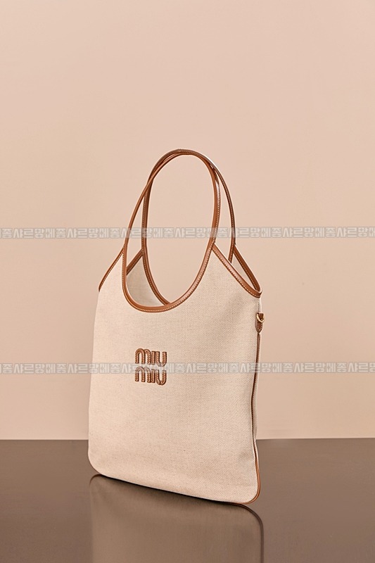 미우미우아이비캔버스토트백 20260315-125114-002루.jpg