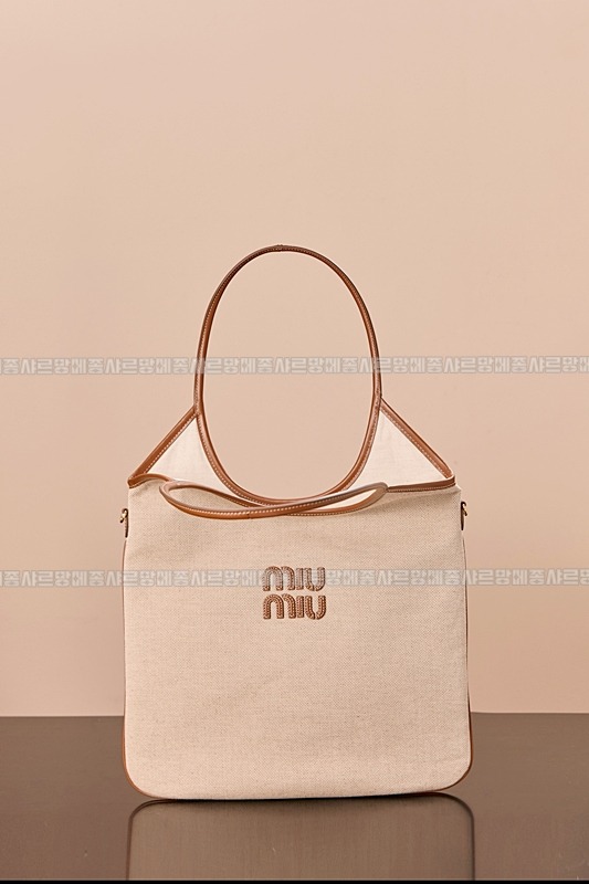 미우미우아이비캔버스토트백 20260315-125115-005루.jpg