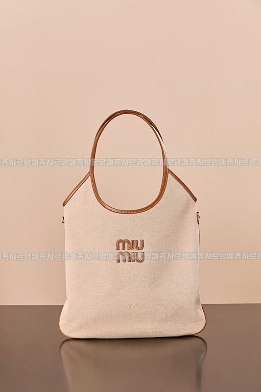 미우미우아이비캔버스토트백 20260315-125115-003루.jpg