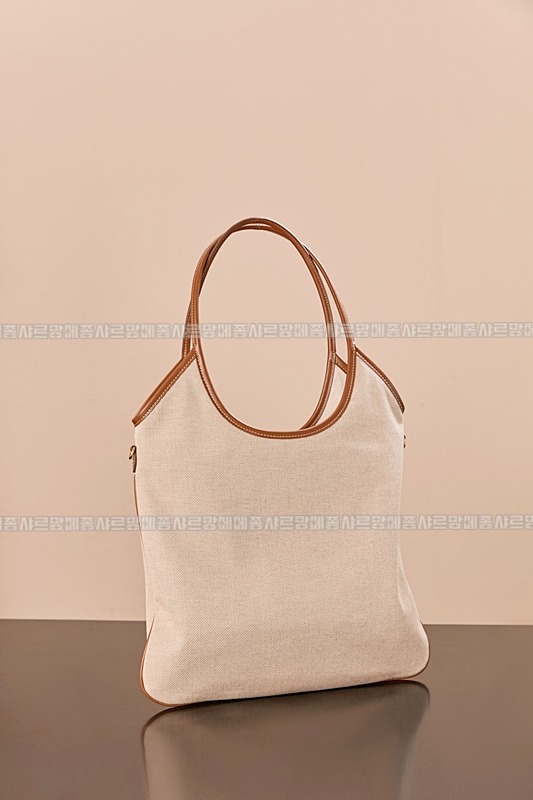 미우미우아이비캔버스토트백 20260315-125115-004루.jpg