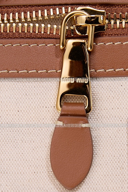 미우미우아이비캔버스토트백 20260315-125117-015루.jpg