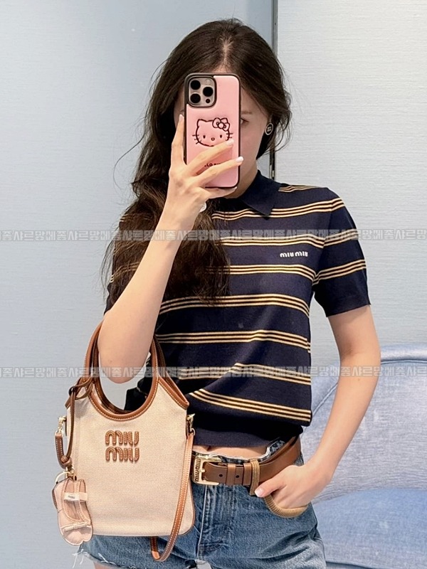 미우미우아이비캔버스토트백 20260315-125450-025루.jpg